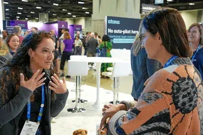 Booth visitors at ATD 2025